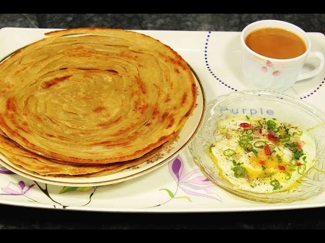 Break fast vii (Fried Egg + Plain Pratha)